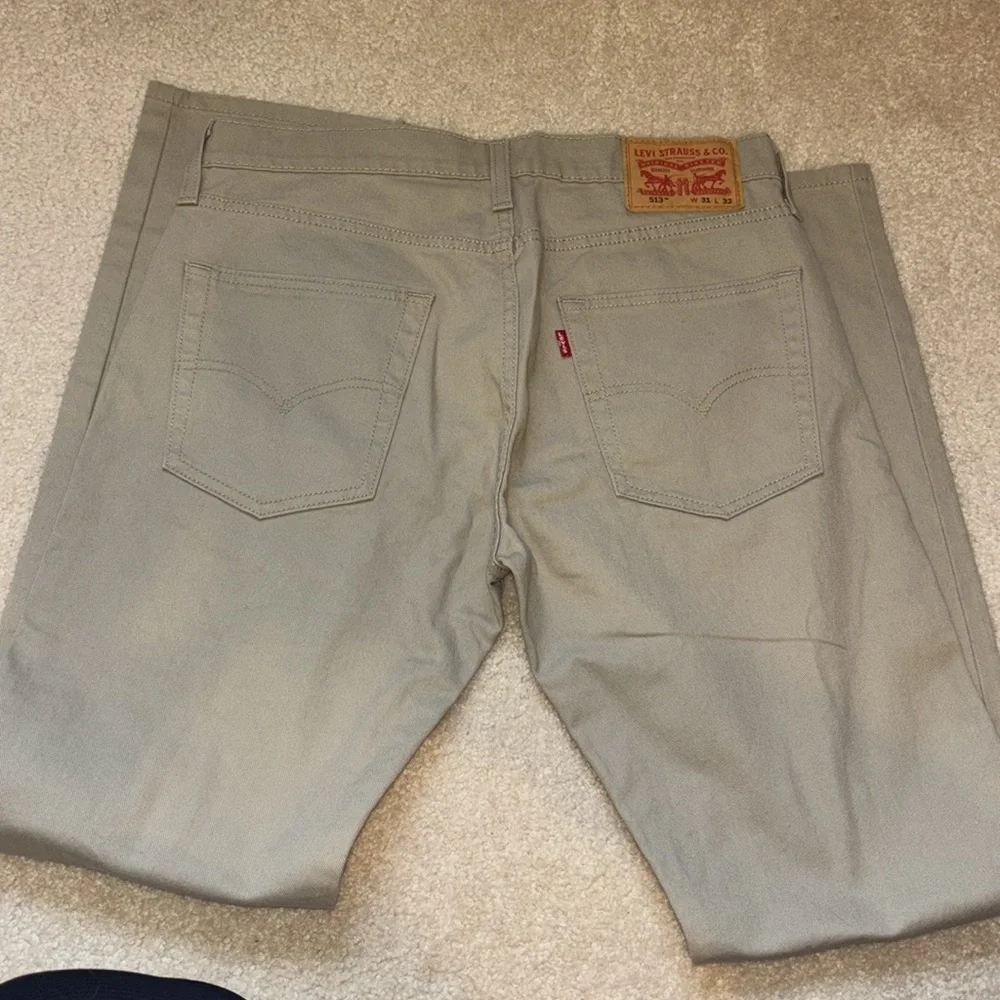 Brown Levi’s 513 Slim Straight - Picture 2 of 4